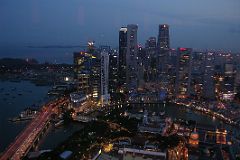 
From the Swissotel Equinox restaurant on the 70th floor, I took photos of the downtown towers, the Singapore River, and the Padong as the lights came on.
